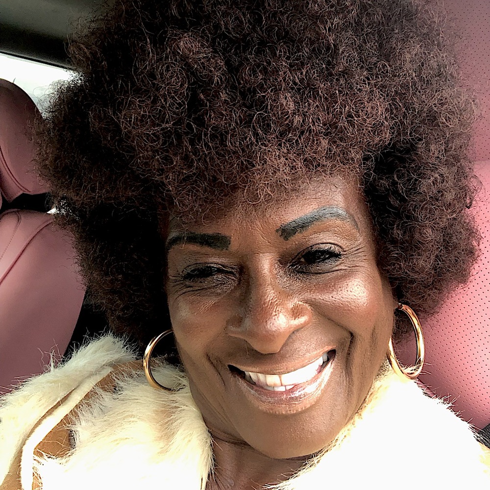 Short brown Afro natural